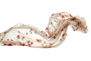 Beautiful floral patterned silk scarf draped gracefully on a white background with soft, flowing fabric