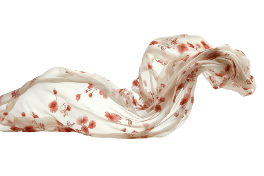 Beautiful floral patterned silk scarf draped gracefully on a white background with soft, flowing fabric