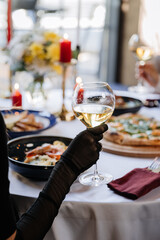 Elegant dining setting with wine and gourmet dishes, perfect for luxurious celebrations or dinners