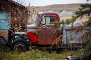 Old rusted red farm truck