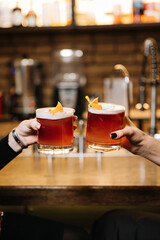 Cheers with crafted cocktails, a celebration of mixology and vibrant bar culture moments
