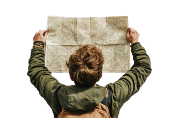 Individual studying a vintage map while standing against a white background, exploring travel routes and destinations outdoors