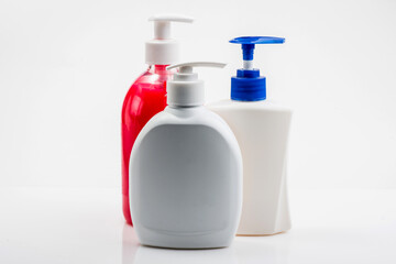 Mockup of white plastic bottle for liquid soap or shampoo with blank label.