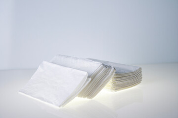 stack of handkerchiefs on white background, space for text