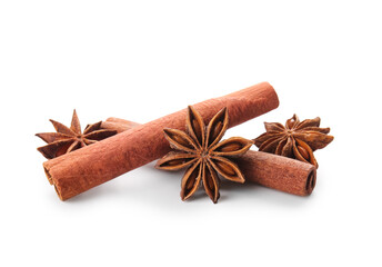 Star anise with cinnamon sticks on white background