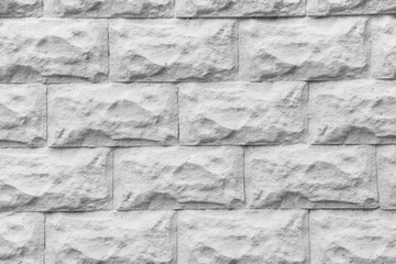 Texture of white brick wall as background, closeup