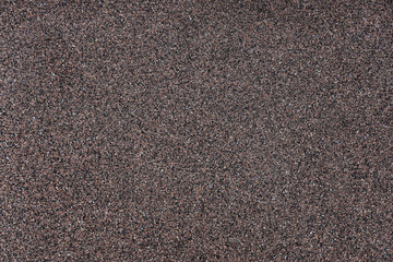 Texture of pebbles on sea beach, top view