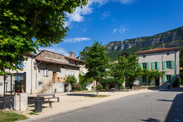 Obraz premium Saou, in the Drôme department, southeastern France, door of Provence. The town offers traditional architecture with its narrow medieval streets and houses under synclinal of Saoû mountain.