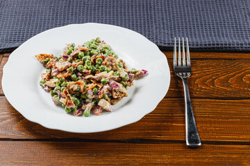 Lviv night sky with incomplete moon hidden in clouds over Ukraine