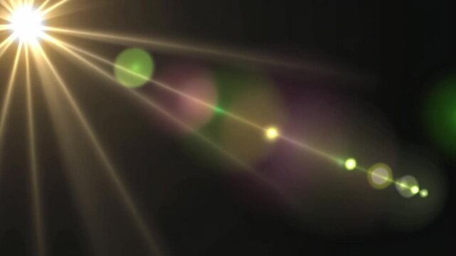 Golden Lens Flare: A radiant burst of golden light streaks across a dark background, creating a dramatic and ethereal lens flare effect with vibrant bokeh.