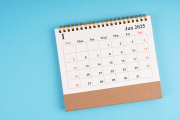 2025 January desk calendar flat lay	

