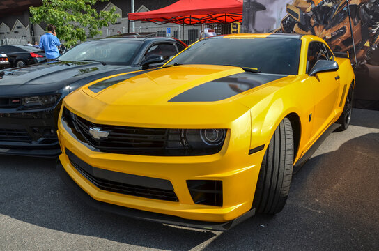Yellow Chevrolet Camaro, classic American muscle car often associated with the "Transformers" movie franchise, continues to captivate car enthusiasts worldwide
