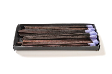 angle view lilac matchbox on a white background at horizontal composition