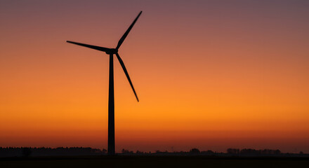 Obraz premium Wind Turbines Visible On The Horizon Of A Vast Nature