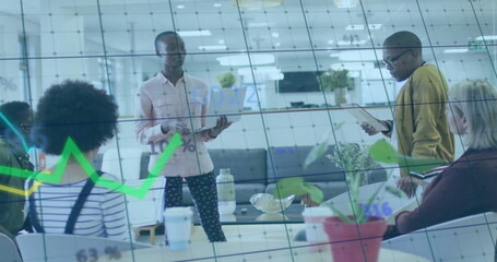 Image of financial data processing over diverse business people in office