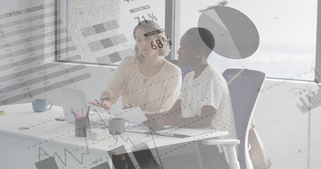 Image of data processing and diagrams over diverse female colleagues discussing work