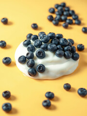 - Creamy yogurt garnished with fresh blueberries and served on a yellow background, delicious meal, vibrant, fruity yogurt, summer harvest, colorful
