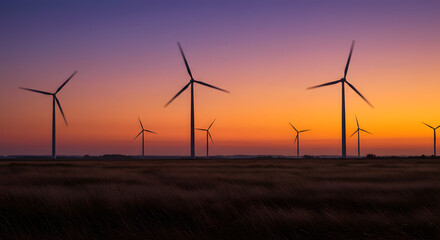 Wind Turbines Spinning On The Horizon Of A Wide, Arid Plateau