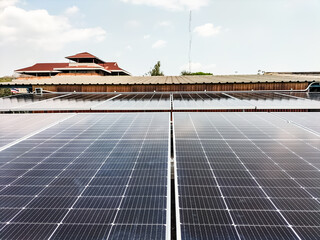Installing solar panels on the roof to use as alternative energy for electricity use.