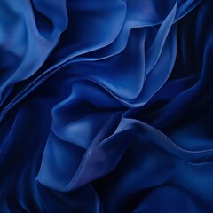 Obraz premium an abstract artwork featuring deep blue flowing waves and folds, creating a dynamic and mesmerizing visual effect with a sense of movement.