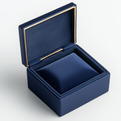 top view of an open empty navy blue velvet ring box, on a white background