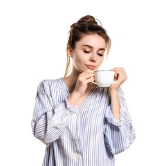 A beautiful smart woman having a coffee before sleep
