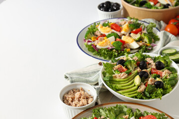 Cooking salad with tuna on a light background.
