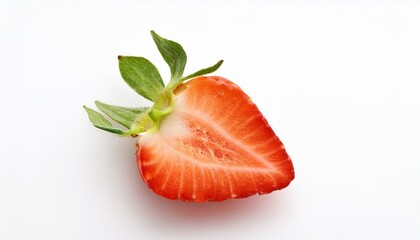 A juicy red strawberry, sliced in half, showcasing its vibrant interior.