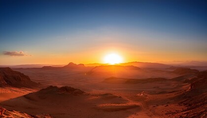 Naklejka premium Desert sunset with warm colors and rocky landscape.