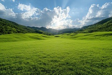 Obraz premium Stunning landscape of rolling green hills and blue sky