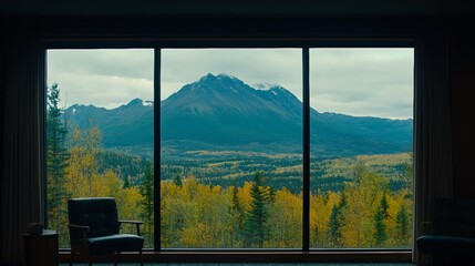 Fototapeta premium Autumnal Mountain Vista Through Panoramic Window