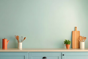 Modern Minimalist Kitchen Interior Design Showcases Wooden Utensils and a Plant on a Countertop with Pastel Green Cabinets