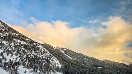 Winter Sunset on I-70 in Colorado, Traveling along I-70 in Colorado during the Winter, between Vail...