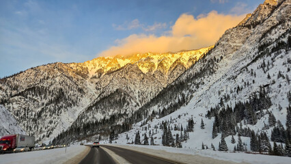 Winter Sunset on I-70 in Colorado, Traveling along I-70 in Colorado during the Winter, between Vail...