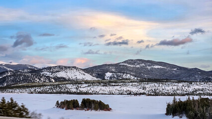 Winter Sunset on I-70 in Colorado, Traveling along I-70 in Colorado during the Winter, between Vail...