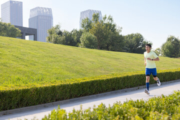 Young man exercising in a park