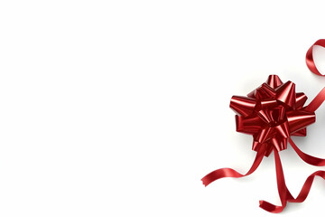 Red Ribbon Bow with Elegant Loops and Loose Ends on a White Background