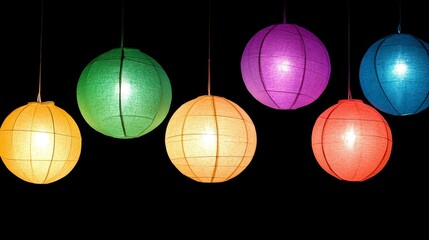 Obraz premium Colorful Hanging Paper Lanterns Illuminating Night