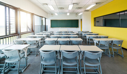 Modern classroom with desks and chairs
