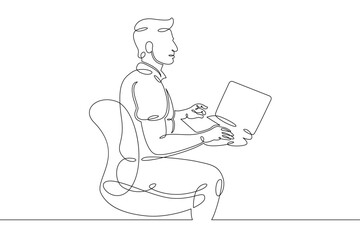 Young man sits working at a laptop computer. Designer manager works on the Internet. One continuous drawing line, logo single hand drawn art doodle isolated minimal illustration.