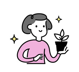 Girl holding a potted plant in her hands