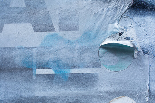 Close up of textured wall and paper