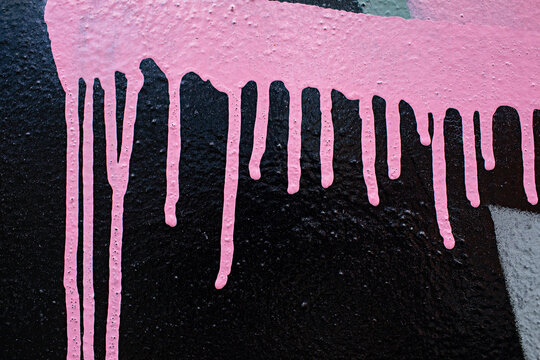 black and pink paint splashes and drips