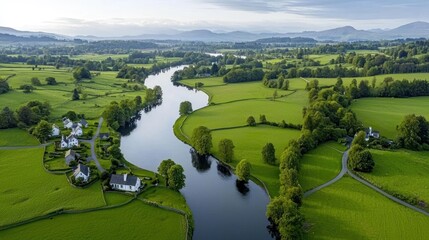 Scenic aerial view of a lush landscape with a winding river.