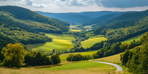 Obraz premium Breathtaking Valley with Winding Roads and Vast Landscape