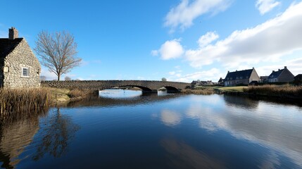 Scenic view of a bridge over a calm river with reflections.