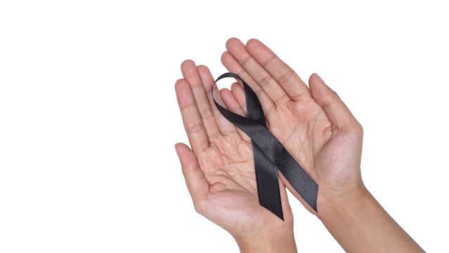 Hands showing black ribbon as symbol to support melanoma awareness isolated on transparent background