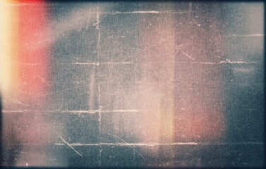 grainy colorful warm green orange blue glitch light leaks on black background with dust texture. abstract damaged scratched retro film analog effect for using over photos as overlay or screen filter