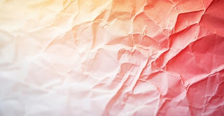 Fototapeta premium Distressed watercolor concept. A textured, crumpled paper background with a gradient of warm colors blending softly.