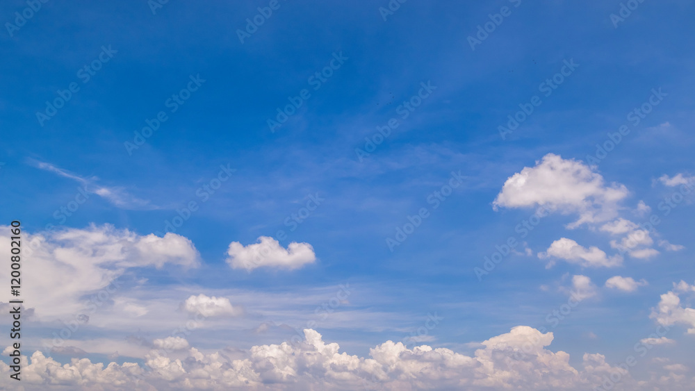Wall mural clear blue sky background,clouds with background, blue sky background with tiny clouds. white fluffy